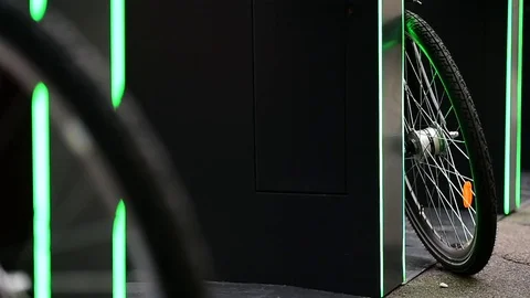 Urban bicycle sharing system wheel detail Vídeo Stock 69750729