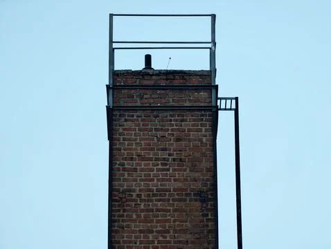 Urban Brick Stack With Equipment. Utilityfocused Brick Chimney With Ladder .. Stock Photos