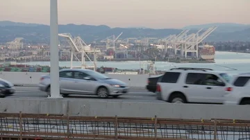 Urban bridge freeway time lapse in front of port Stock Footage 86125429