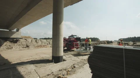 Urban building site. Construction workers planning out their project while on an Stock Footage 143563316
