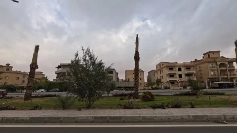 Urban Car Drive Through Streets New Cairo Showing Traffic Buildings And City Stock-Footage 330092995