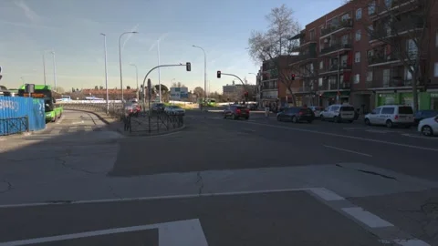 Urban city intersection with traffic and pedestrians, Madrid street scene Stock-Footage 329510032