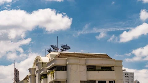 Urban City Time lapse. Dramatic Clouds in the Blue Sky over the City Roofs. Sate Stock Footage 116614595