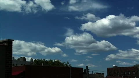 Urban cloud blue sky timelapse Stock Footage 10991803