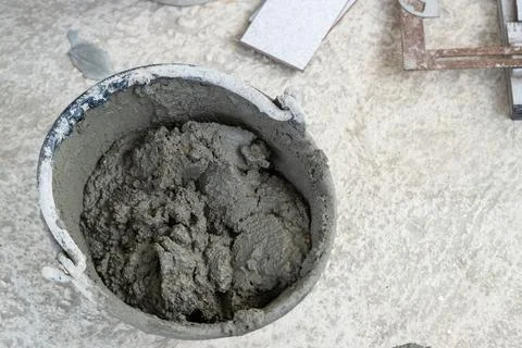 Urban construction close-up process of mixing concrete for building projects 스톡 사진