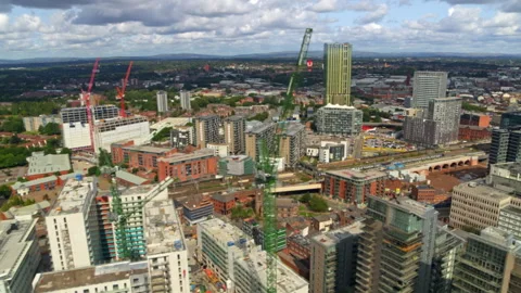 Urban construction development in a modern city aerial view Stock Footage 336800590
