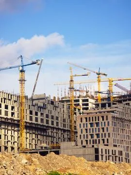 Urban construction project featuring cranes Stock Photos