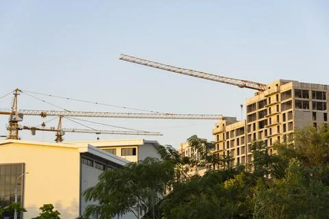 Urban Construction Site with Multiple Tower Cranes Stock Photos