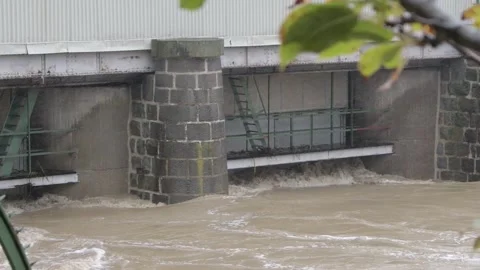 An urban dam to hold the river level during flooding after heavy rains in Vienna Stock Footage 284738208