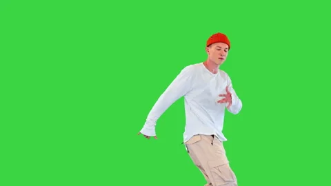 Urban dancer doing some hip-hop moves on a Green Screen, Chroma Key. 스톡 동영상 219230094