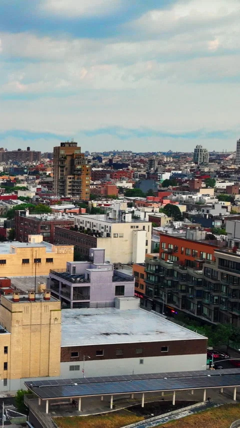 Urban density with rooftop green space and circular ramp in midtown Manhattan. Stock Footage 319164865