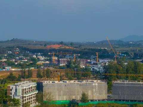 Urban Development with Construction Cranes in Phuket, Thailand Stock Photos