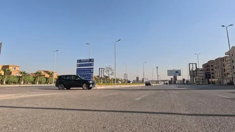 Urban Drive Across Tree Lined Roads New Cairo Showing Buildings Traffic Life Stock Footage 329801443