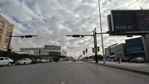 Urban Drive Through Active Residential Roads New Cairo Showing Buildings Traffic Video stock 329701161