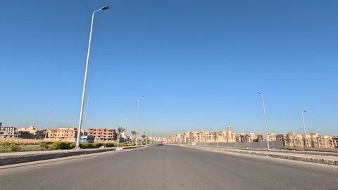 Urban Drive Through Active Streets New Cairo Showing Buildings Traffic Vehicles Stock Footage 329670720
