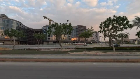 Urban Drive Through Broad City District Roads New Cairo Showing Buildings Stock-Footage 329891787