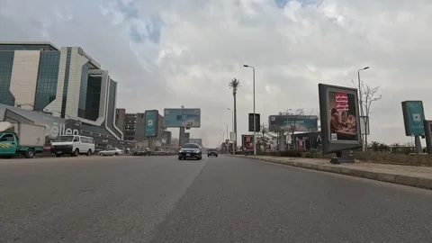 Urban Drive Through Organized roads New Cairo Showing Buildings Traffic Life Stock Footage 330113051