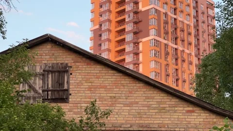 Urban Encroachment: The Vanishing Suburban Idyll as High-Rise Modernity Engulfs 動画素材 276141553
