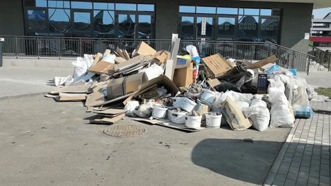 In an urban environment, there is a significant accumulation of discarded waste Video stock 343731543
