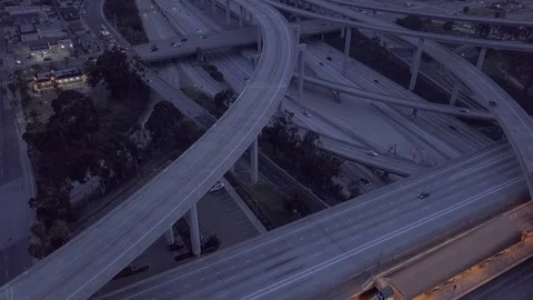 Urban Freeway Sunrise Tilt Up Stock Footage