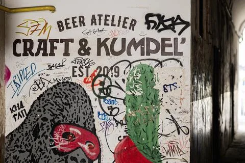 Urban graffiti on a wall featuring creative designs and street art elements.. 스톡 사진