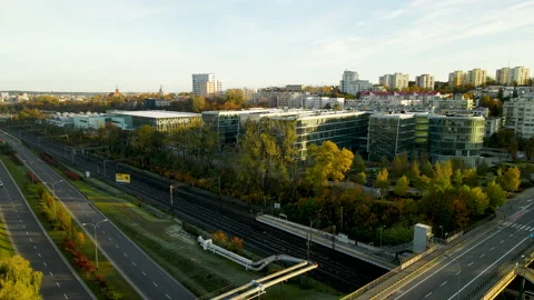 Urban highway intersection with glass skyscraper city buildings aerial Stock Footage 164016323