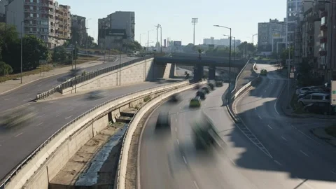 Urban highway traffic commuting through cityscape Stock Footage 345748013