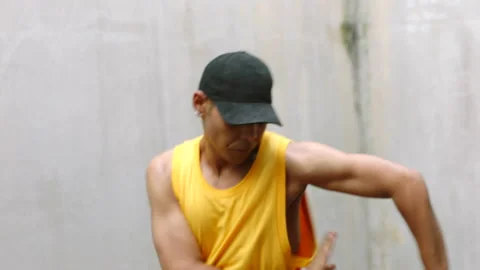 Urban hip hop dancer with creative talent and energy in grunge aesthetic Stock Footage 225630198