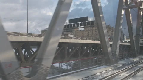Urban industrial view from train window. Bridge and highway with traffic with Stock Footage 134145050