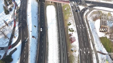 Urban infrastructure and traffic flow in winter. Vehicles moving at city streets Video stock 328294345