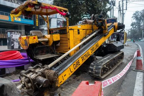 Urban Infrastructure Development: Roadside Digging for Underground Wiring, .. Stock Photos