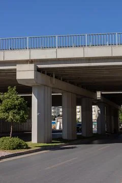 Urban infrastructure features an elevated road structure on a clear day in a Stock Photos
