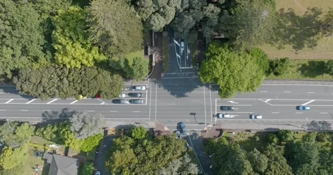 Urban intersection amidst parkland. Stock-Footage 295018879