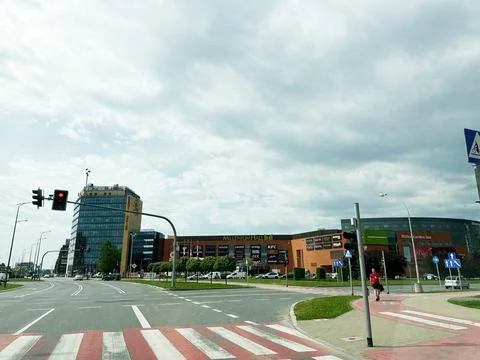 Urban intersection and Millenium Hall shopping mall in Poland with pedestri.. Stock Photos