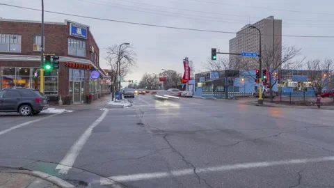 Urban Intersection at Dusk Traffic and in Minneapolis on October 9, 2022 Video stock 348218534