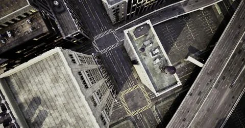 Urban intersection in a modern city captured from above during daytime Illustrazione stock