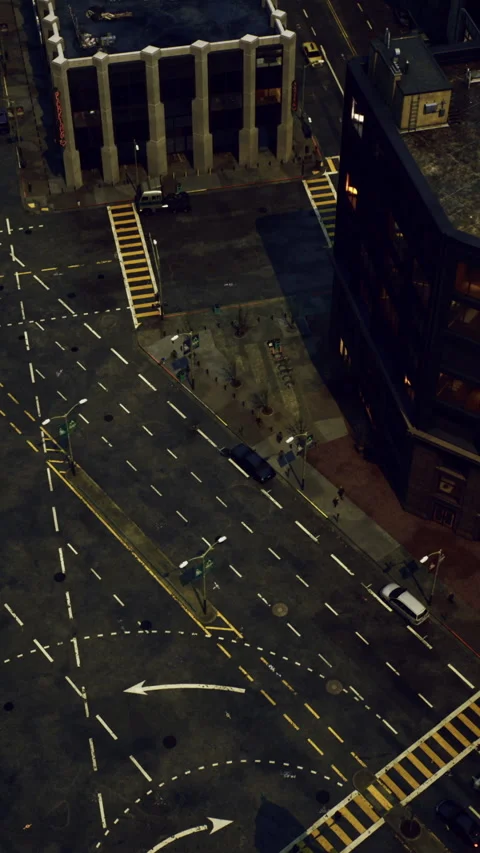 Urban intersection at night with traffic lights and dynamic street patterns Stock Footage 327776377