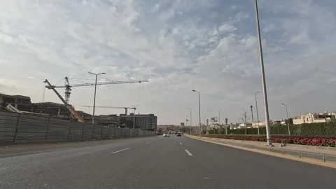 Urban Journey Through Busy Streets New Cairo Showing Buildings Traffic And City Stock Footage 329763534