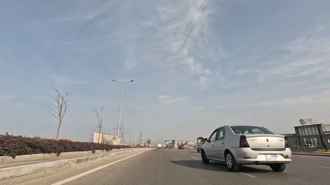 Urban Journey Through Modern Roads New Cairo Showing Buildings Traffic And Life Stock Footage 329758053