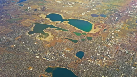 Urban Lakes and Suburban Development Across Expansive Landscape 스톡 동영상 337950396