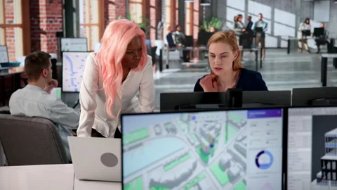 Urban Land Mapping Engineer Analyzes 3D City Data Stock Footage 332902115