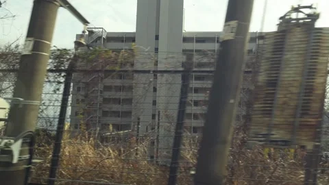 Urban Landscape Through Moving Train Vídeos de archivo 287975995