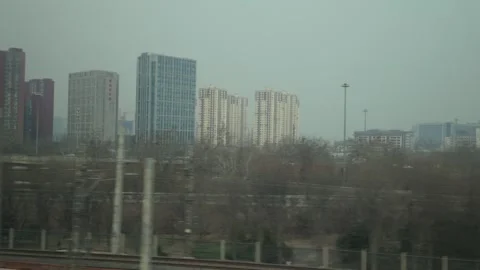 Urban Landscape View from High-Speed Train Window, Beijing to Xi'an Route, China Stock Footage 334960801
