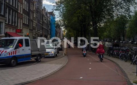 Urban Life In Dutch City Amsterdam