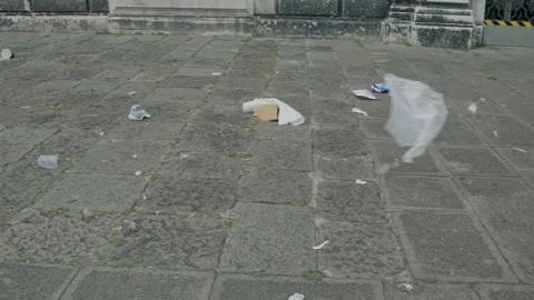 Urban litter on pavement Stock Footage 270074463