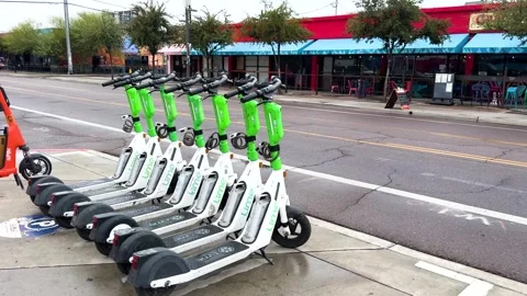 Urban Mobility with Dockless Scooters Stock Footage 275417865