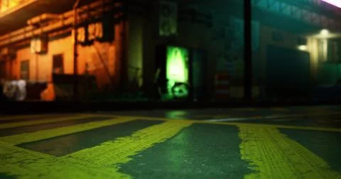 Urban night view with illuminated building and colorful pavement patterns Ilustración de archivo