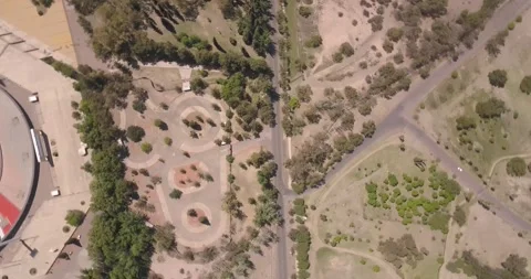 Urban Oasis: A Drone's Quick Glide Through the City Park Stock Footage 274364217