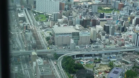 Urban Osaka Skyline with Elevated Highway and Railway Junction Stockbeeldmateriaal 314533457