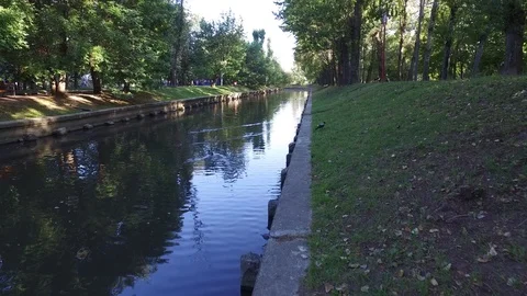 Urban park with river Stock Footage 115158764